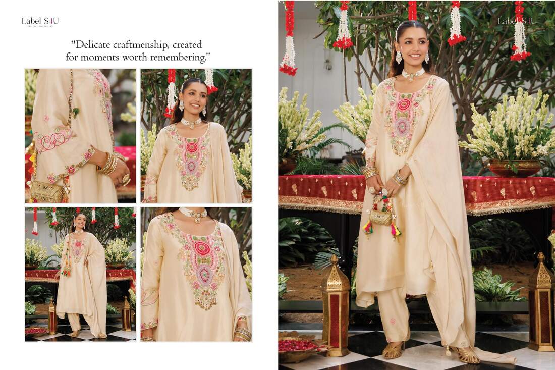 Ivory suit set with multicolour neckline embroidery